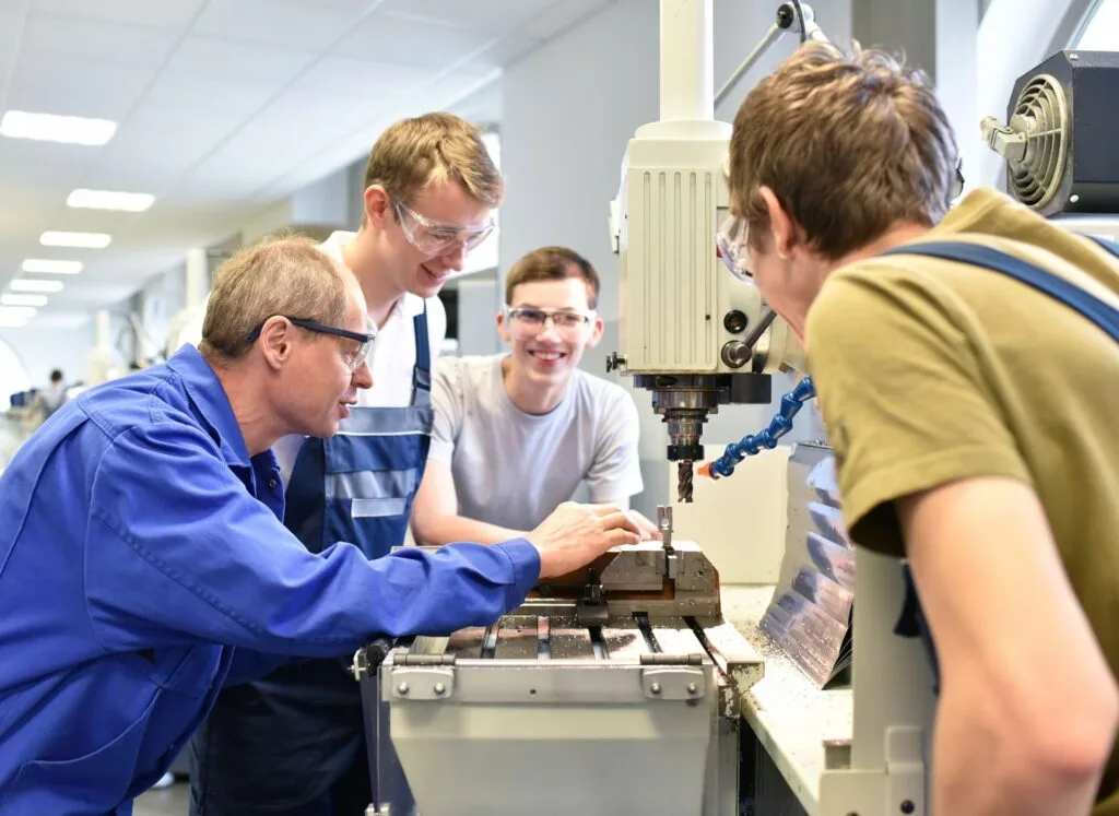 Group of young workers in a training workshop