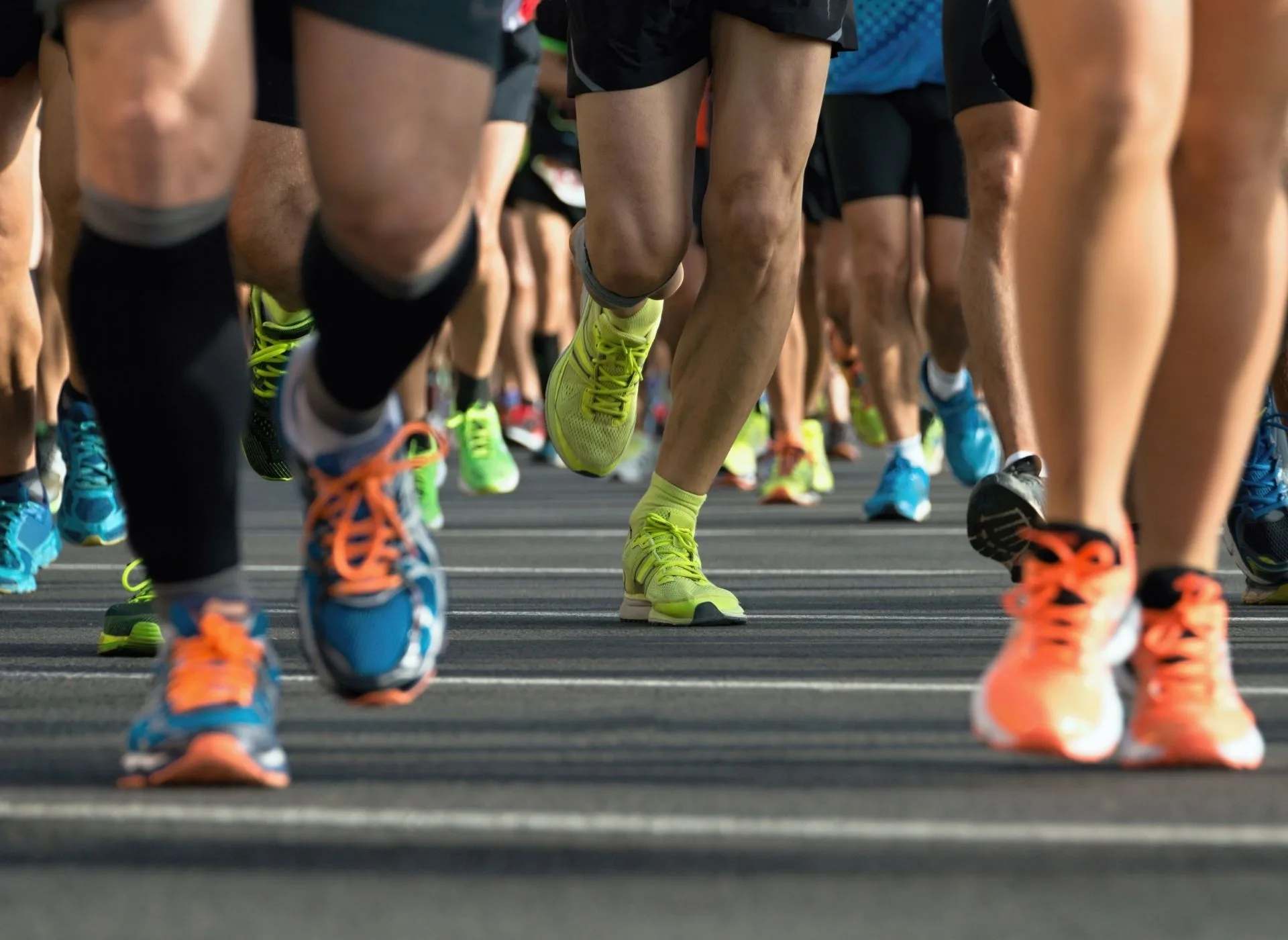 A close up of an actual running event with view of trainers
