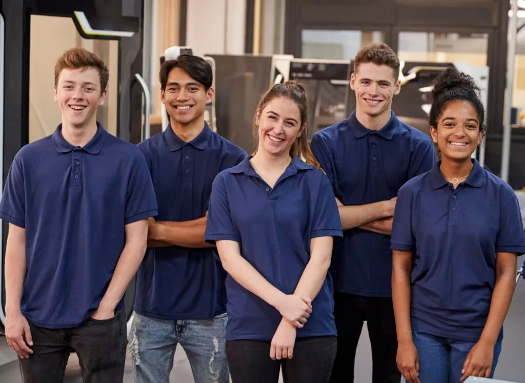 A group of your apprentices in blue t-shirts
